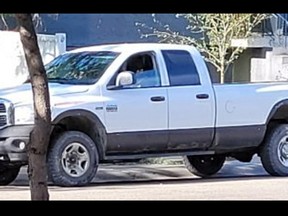 Pictured is the white 2006 Dodge Ram truck that was captured on CCTV footage at the scene of the shooting.