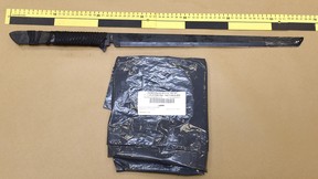 A supplied image from ASIRT shows a long-edged weapon a man was carrying when confronted by officers in the municipal building.