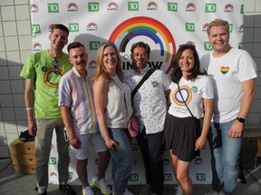 The recent Mingle in Inglewood Pride Patio Party was a success thanks to presenting sponsor TD. Pictured, from left, are TD’s Alex Gysen with husband William Bernicot; TD’s Kari Scarlett, Matt Lawson, Georgiana Feher and Logan Wasyliw.