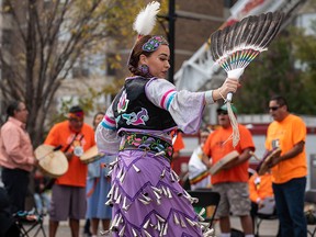 Michellaine Sleigh performs a Jingle Dress dance during the first National Day for Truth and Reconciliation at Fort Calgary on Sept. 30, 2021.
