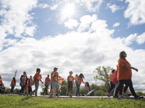 Canadians have many steps to go to achieve truth and reconciliation, writes Mark Kolke. But it's a journey we must take. 
Members of the Tyendinaga, Ont., community walk Sept. 30, 2021, in an event organized by the Tyendinaga Native Women's Association to promote healing and positivity on the first National Day for Truth and Reconciliation.