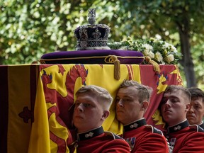 Pallbearers carry the coffin of Queen Elizabeth II as it arrives at Westminster Hall from Buckingham Palace for her lying in state, on September 14, 2022 in London, United Kingdom.