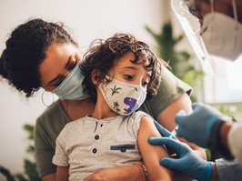 Kid receiving covid vaccine at home