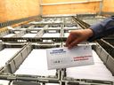 Ballots for the UCP leadership vote are loaded onto a courier truck at All Rush Print and Apparel in northeast Calgary on Friday, September 2, 2022.