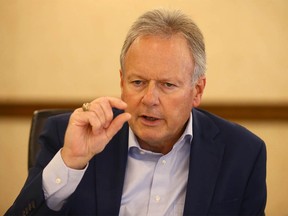 Stephen Poloz, former Governor of the Bank of Canada, speaks with Postmedia columnist Chris Varcoe during the 2022 Global Business Forum in Banff, Canada, on Thursday, September 22, 2022.