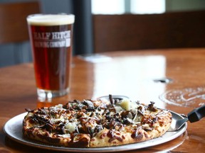 Wild mushroom pizza with aged cheddar, parmesan and fresh herbs topped with a drizzle of truffle oil and balsamic reduction at The Mash on 5th Street S.W. in Calgary. Jim Wells/Postmedia