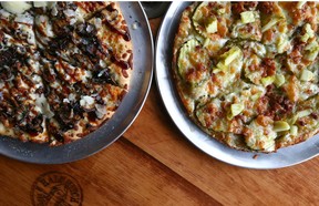Wild Mushroom Pizza with Aged Cheddar, Parmesan and Fresh Herbs topped with a drizzle of Truffle Oil and Balsamic Reduction, left, and Bacon Dill Pickle Pizza (crust covered in garlic butter ), topped with aged cheddar, more pickles, a drizzle of honey and the spices featured at The Mash. Jim Wells/Postmedia