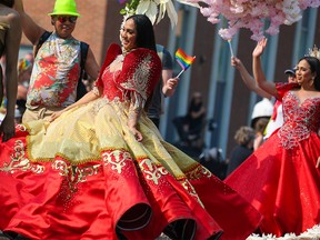 Calgarians celebrated during the Pride Parade in downtown on Sunday, September 4, 2022.