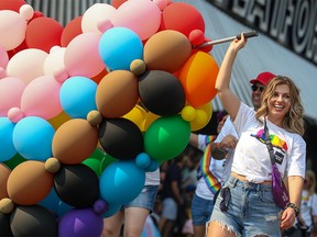 Calgarians celebrated during the Pride Parade in downtown on Sunday, September 4, 2022.