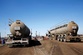 A tanker truck used to transport petroleum products operates at an oil facility near Brooks.