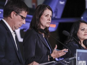 Candidate Danielle Smith, centre, speaks during a United Conservative Party of Alberta (UCP) leadership debate in Medicine Hat, July 27, 2022.