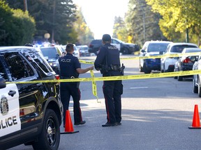 Calgary police investigate after two people were shot at 1715 28th Ave. S.W. in Calgary on Tuesday, September 27, 2022.