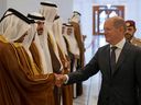 German Chancellor Olaf Scholz is welcomed upon arrival at the Amiri Diwan in the capital Doha on September 25, 2022. Germany has long-term natural gas agreements with several countries, including Qatar, but not with Canada, notes Ron Wallace.