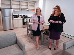 HomeSpace CEO Bernadette Majdell, left, and Heather Morley, executive director with Inn from the Cold, stand in one of the apartments in Neoma on Thursday.