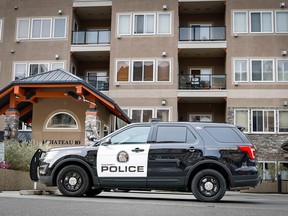 A Calgary Police Service cruiser is pictured at the scene of a then-thought to be suspicious death in the southwest neighbourhood of Discovery Ridge on Monday, September 12, 2022.