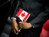 New Canadians take their oath during a special citizenship ceremony.
