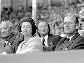 Queen Elizabeth and Prince Phillip in Calgary in 1973, with Pierre Trudeau in background. Photo: Provincial Archives of Alberta.