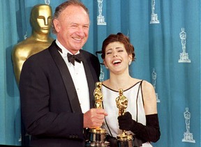 Actors Gene Hackman and Marisa Tomei pose with their Oscars in 1993. Hackman won best supporting actor for his role in Unforgiven. Scott Flynn, AFP-Getty