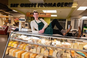 Say Cheese Fromagerie owner Isaac Bignell at Crossroads Market. Azin Ghaffari/Postmedia
