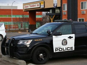 Calgary police investigate the death of a woman at the Airport Traveller's Inn on Wednesday, March 24, 2021.