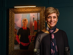Mayor Jyoti Gondek poses for a photo at the unveiling of her painted portrait at Keating Painted Portraits studio on Sunday, October 16, 2022.