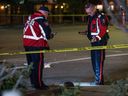 Calgary police investigate at the scene of a hit-and-run involving a teen at 16th Avenue and 46th Street N.W. on Monday.