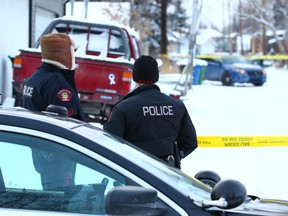 Calgary police monitor the scene of a suspicious death near Ranchero Rise and Ranchlands Blvd. N.W. on Nov. 4, 2017.