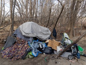 The provincial government announced on October 1, 2022, millions of dollars in new spending to address homelessness and addiction in Calgary and Edmonton.  Pictured, one of several homeless encampments along the Bow River near Calgary's Sunnyside neighborhood, as seen on April 27, 2022.