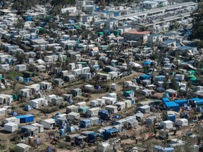 The Moria Refugee Camp on the Island of Lesvos was extremely overcrowded. At one point, 22,000 refugees lived in a space meant for less than 3,000. Guy Smallman/Getty Images.