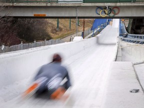 A skeleton athlete trains on the 1988 Calgary Olympic track at Canada Olympic Park in Calgary, Alta., Wednesday, Oct. 24, 2018. Provincial government money set aside to renovate the sliding track has been redirected into the park's commercial side to a public day lodge.THE CANADIAN PRESS/Jeff McIntosh