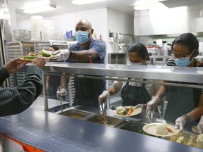A Thanksgiving meal will be served by volunteers to customers at the Mustard Seed's SE Calgary location on Monday, October 10, 2022.