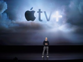 Apple CEO Tim Cook speaks at the Steve Jobs Theater during an event to announce new products, in Cupertino, Calif., Monday, March 25, 2019.
