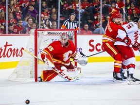 Oct 22, 2022; Calgary, Alberta, CAN; Calgary Flames goaltender Jacob Markstrom (25) guards his net against the Carolina Hurricanes during the third period at Scotiabank Saddledome.