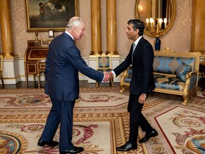 King Charles III welcomes Rishi Sunak during an audience at Buckingham Palace, London, where he invited the newly elected leader of the Conservative Party to become Prime Minister and form a new government on Tuesday October 25, 2022.