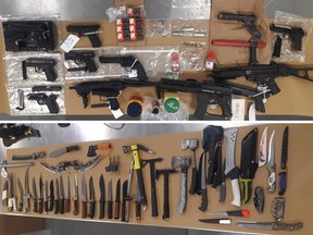 An assortment of knives, machetes and firearms, both real and imitation, seized by Calgary police from a home on Rossdale Road S.W. after a 17-month investigation.