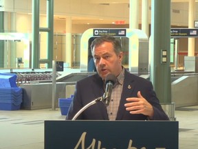 Premier Jason Kenney announces the Alberta government's next actions to combat human trafficking in the province at a press conference at the Edmonton International Airport on October 2, 2022.