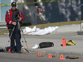 Calgary police investigate at the scene of a serious pedestrian accident at 1st Street between 11th and 12th Avenue N.W. on Wednesday, October 26, 2022.