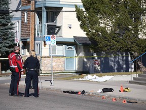 Calgary police investigate at the scene of a serious pedestrian accident at 1st Street between 11th and 12th Avenue N.W. on Wednesday, October 26, 2022.