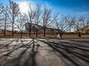 Midday sun casts shadows north of the Scotiabank Saddledome on October 19, 2022. 