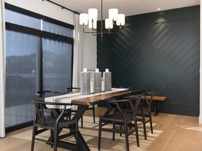 The texture of wall panelling adds interest to this dining area.