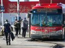 Transit users at the Chinook CTrain station bus loop were photographed on Sunday, January 16, 2022.
