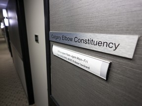 Signs at the Calgary-Elbow constituency office of former MLA Doug Schweitzer were photographed on Monday, October 10, 2022.