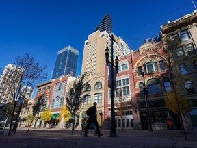 Morning sun lights some of the historic buildings along Calgary's Stephen Avenue Mall on Thursday, October 13, 2022.
