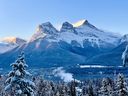 The Three Sisters mountains rise above Canmore on Oct. 30, 2021. 
