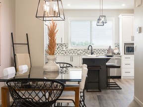 The dining area in the Easton show home by Morrison Homes in Wedderburn, Okotoks.