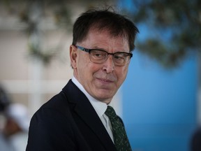 B.C. Health Minister Adrian Dix pauses while speaking during an announcement in Burnaby, B.C., on Monday, May 30, 2022.