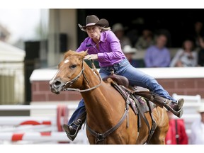Taber-area barrel racer Nancy Csabay, seen here at the Calgary Stampede Rodeo, is one of the Alberta rodeo stars who inspired characters in the play Cowgirl Up.