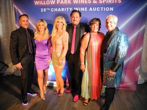 At the Willow Park Wines and Spirits 29th Charity Auction in support of the Vintage Fund are, from left: Willow Park Wines & Spirits president Scott Henuset with his wife Suzanne Henuset, president of Modern Rentals and Modern Events; Vintage Fund co-chairs Karen and Reid Henuset; and parents Liz and Wayne Henuset. The event raised more than $220,000. Photos, Bill Brooks