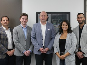 The team at JR Mercantile Real Estate Advisors, from left, Andrew Kay, Alex Morrison, president Jeff Robson. Keiana Smith and Tareq Merali.