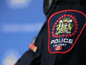 A Calgary Police officer displays the new shoulder badge in Calgary on Thursday, January 10, 2019.